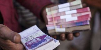 Rupee hovering around a five-month against the dollar