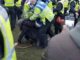 36 arrested in UK over protests against covid restrictions