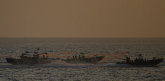 A Pakistan Navy ship rescues eight Iranian fishermen at sea